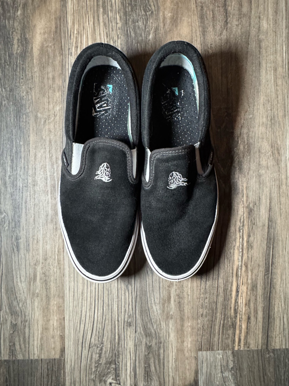 Vans Black Slip-On Loafers with White Foxing Stripe